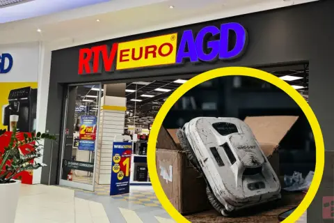 Robot do mycia okien w kartonie, przed sklepem RTV Euro AGD. Sprawdzanie statusu reklamacji może być proste.