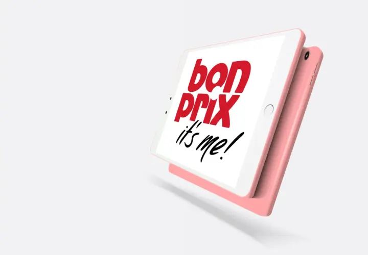 Różowy tablet z napisem "bon prix it's me!". Łatwe bonprix zwroty przez aplikację.