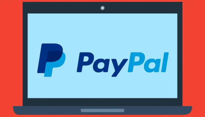 Laptop z logo PayPal. To narzędzie dla każdego media expert, ułatwiające płatności online.